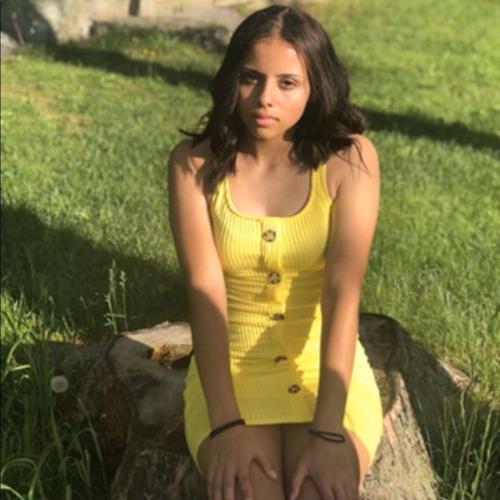 A yellow, midi dress.